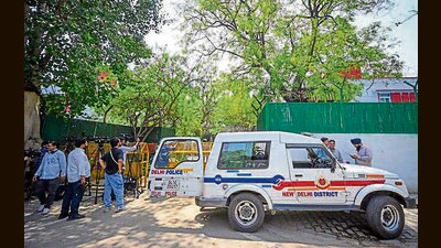 Delhi Police officials seen outside the residence of Rajya Sabha MP Sanddep Pathak on Pandara Road in New Delhi on Saturday. (Sanchit Khanna/HT) Delhi Police officials seen outside the residence of Rajya Sabha MP Sanddep Pathak on Pandara Road in New Delhi on Saturday. (Sanchit Khanna/HT)