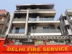 A fire brigade at the four-storey residential building in the Vivek Vihar area after a massive fire broke out on Sunday.