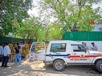 Delhi Police officials seen outside the residence of Rajya Sabha MP Sanddep Pathak on Pandara Road in New Delhi on Saturday. (Sanchit Khanna/HT)