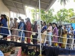 People wait in a queue to cast votes during the Kerala assembly elections. (PTI) People wait in a queue to cast votes during the Kerala assembly elections. (PTI)