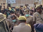 Police personnel conducting an investigation in Ambedkar Nagar district on Saturday. (PTI PHOTO)