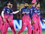 Rajasthan Royals players celebrate with Ravindra Jadeja (C) after he removed Delhi Capitals batter Pathum Nissanka in their IPL game in Jaipur on Friday. (AFP)