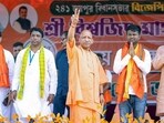 Uttar Pradesh Chief Minister Yogi Adityanath shows a victory sign during a public meeting in Garbeta Assembly constituency, in Paschim Medinipur (@myogiadityanath X/FIle Photo)