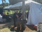 At Trump’s golf course in Florida, a man was taken into custody by the Secret Service after disregarding commands and becoming physical with an agent. 