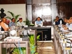 Pushkar Singh Dhami chairs a review meeting of CM announcements in Dehradun.