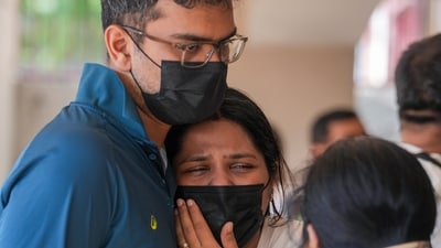 Family members and relatives of victims mourn after a fire in a four-storey residential building killed at least nine people, at Vivek Vihar area, in New Delhi. (PTI) Family members and relatives of victims mourn after a fire in a four-storey residential building killed at least nine people, at Vivek Vihar area, in New Delhi. (PTI)