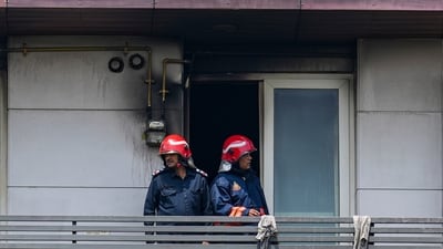 Firemen in the four-storey residential building where a fire killed at least nine people, at Vivek Vihar area, in New Delhi. (PTI) Firemen in the four-storey residential building where a fire killed at least nine people, at Vivek Vihar area, in New Delhi. (PTI)