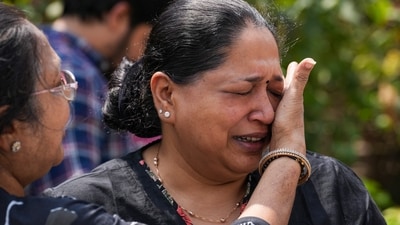 People gather after a fire in a four-storey residential building killed at least nine people, at Vivek Vihar area, in New Delhi. (PTI) People gather after a fire in a four-storey residential building killed at least nine people, at Vivek Vihar area, in New Delhi. (PTI)