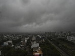 A dense layer of dark monsoon clouds engulfs the skyline as rain and low visibility blanket at Gomti Nagar extension in Lucknow on Monday (Deepak Gupta/HT)