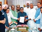 BJP leaders submitting a memorandum to Punjab governor Gulab Chand Kataria in Chandigarh on Sunday. (HT Photo)