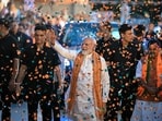 PM Narendra Modi waves to supporters at party headquarters in New Delhi. PM Narendra Modi waves to supporters at party headquarters in New Delhi.