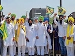 Members of the Azad Kisan Morcha during the stir at the Ladhowal toll plaza in Ludhiana on Monday. (HT PHOTO) Members of the Azad Kisan Morcha during the stir at the Ladhowal toll plaza in Ludhiana on Monday. (HT PHOTO)