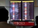 People look at a screen displaying flight information at IGI airport in Delhi. (Reuters File)