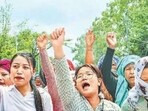 People participate in a public rally organised to mark three years of Manipur conflict in Bishnupur on Sunday.