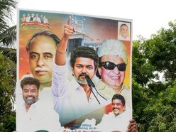 టీవీకే అధినేత విజయ్ పోస్టర్ తో పార్టీ కార్యకర్తలు