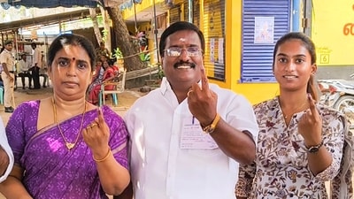 Puducherry: Leader of Opposition in Puducherry Assembly and DMK candidate from Villiyanur constituency R Siva and his family members show their ink-marked fingers after casting votes during the Puducherry Assembly elections, at a polling station in Puducherry, Thursday, April 9, 2026. (PTI Photo) (PTI04_09_2026_000290B) (PTI)