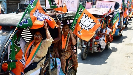 ECI Guwahati election results LIVE: Guwahati, Apr 07 (ANI): BJP supporters during an election campaign for Central Guwahati Assembly Constituency, in Guwahati on Tuesday. (ANI Photo) ECI Guwahati election results LIVE: Guwahati, Apr 07 (ANI): BJP supporters during an election campaign for Central Guwahati Assembly Constituency, in Guwahati on Tuesday. (ANI Photo)