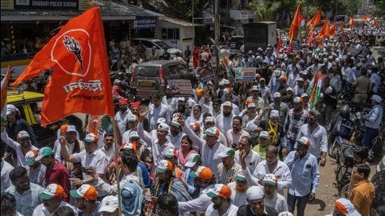 On Monday, around 250-odd protesters waved banners of the Dharavi Bachao Andolan, shouting “Adani hatao, Dharavi bachao.” (Satish Bate/ Hindustan Times)