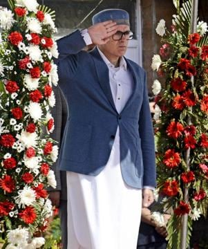 Chief minister Omar Abdullah taking the salute during the guard of honour marking the annual darbar move at the civil secretariat in Srinagar on Monday. (PTI Photo) Chief minister Omar Abdullah taking the salute during the guard of honour marking the annual darbar move at the civil secretariat in Srinagar on Monday. (PTI Photo)