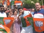 Bharatiya Janata Party (BJP) workers celebrate party’s victory in West Bengal assembly polls, in Amritsar on Thursday. (Sameer Sehgal/HT)