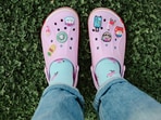 Colourful Crocs are ready for summer days, which pair easily with casual outfits and travel looks. (Pexels.com)