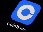 A viral post claims Coinbase is selling H-1B visas and replacing American workers, following layoffs. However, evidence shows this is misleading. (AP Photo/Matt Slocum, File)