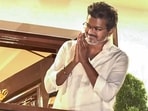 TVK chief and candidate from the Tiruchirappalli East constituency, Vijay, greets from the residence of his father, SA Chandrasekhar, as he leads in vote counting in the Tamil Nadu Assembly election results, in Chennai, Monday, May 4, 2026.
