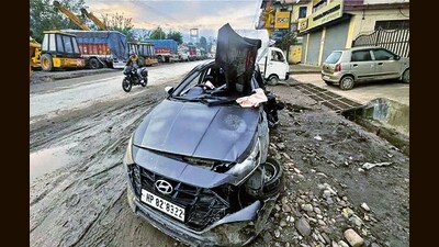 The mangled remains of car after accident in Mandi on late Monday night. (HT Photo)