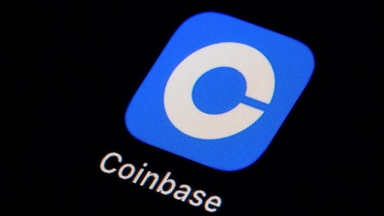 A viral post claims Coinbase is selling H-1B visas and replacing American workers, following layoffs. However, evidence shows this is misleading. (AP Photo/Matt Slocum, File) (AP)