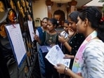 GSEB Gujarat 10th Result LIVE: Students of the 10th class of the Gujarat Board search for their names before the Secondary Board exams in Ahmedabad(ANI File)