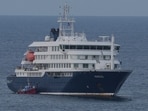 The MV Hondius cruise ship is anchored at a port in Praia, Cape Verde, Wednesday, May 6, 2026. (AP Photo/Misper Apawu)