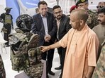 Chief minister Yogi Adityanath visits a stall during the North Tech Symposium 2026, in Prayagraj, Wednesday. (PTI Photo)