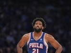 Philadelphia 76ers' Joel Embiid reacts during the first half of Game 1 in a second-round NBA basketball playoffs series against the New York Knicks