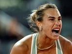 Belarus' Aryna Sabalenka reacts after winning a point to US' Hailey Baptiste during their 2026 WTA Tour Madrid Open tennis tournament singles match