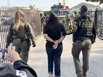 Moreno-Lopez was taken into custody after nearly two dozen Drug Enforcement Administration agents raided her apartment.