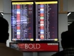 People look at a screen displaying flight information at IGI airport in Delhi. (Reuters File)