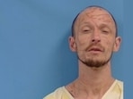 The man was later identified as 41-year-old Preston Landis, who had allegedly been living in a makeshift setup in the basement.