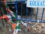Trinamool Congress flags thrown near a tree in Kolkata after the party’s loss in the assembly elections. (AP)
