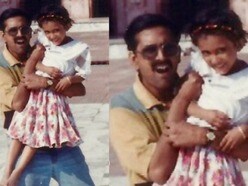 বাবার কোলে হাসি মুখের ফ্রক পরা মেয়েটিকে চিনতে পারছেন? এখন কিন্তু টলিপাড়ার নায়িকা!