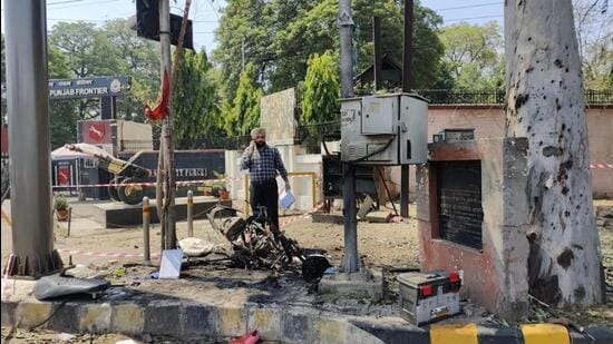 An investigator at the blast site outside the Punjab Frontier headquarters of the Border Security Force (BSF) in Jalandhar on Wednesday. (HT Photo)