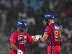 LSG's Aiden Markram and skipper Rishabh Pant celebrate their partnership during a match.