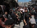Mourners attend the funeral of Azzam Al-Hayya, the son of Khalil Al-Hayya, after Azzam succumbed to his injuries on Thursday.