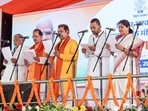 JD(U) leaders Shravan Kumar, Nishant Kumar and Lesi Singh, and BJP leaders Vijay Kumar Sinha and Dilip Jaiswal take oath during the swearing-in ceremony of the Bihar cabinet of the NDA government at Gandhi Maidan in Patna on Thursday. (PTI)