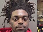 Kodak Black's mugshot (L) and Kodal Black performing.