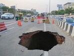 Officials said the collapse near Sector 47 was caused by failure of an ageing master sewer line beneath the highway. (Parveen Kumar/HT)