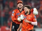 Sunrisers Hyderabad's Nitish Kumar Reddy, right, celebrates with wicketkeeper Ishan Kishan after taking the wicket of Punjab Kings' Prabhsimran Singh
