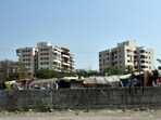 Pune, India -January 27, 2023 :Residents of Rhythm housing society, Wakad demanding to take action against illegal huts which has come up on open land near society in Pune, India, on Friday,January 27 , 2023.(HT PHOTO)