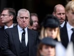 File photo of former British prince Andrew as he stands next to Prince William.