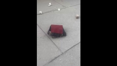 ₹21 lakh kept in two bags were flung onto the ground from a window of the Western Towers in Kharar area.The search parties recovered the scattered cash, which was in the denomination of ₹500, said ED officials. (HT) ₹21 lakh kept in two bags were flung onto the ground from a window of the Western Towers in Kharar area.The search parties recovered the scattered cash, which was in the denomination of ₹500, said ED officials. (HT)