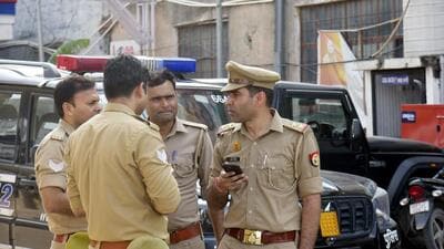 After the robbery, during which a shot was also fired, police found the looted van dumped on the Delhi-Meerut Expressway (DME) near Kushaliya, about 15 km from the incident site, ahead of Masuri. (Sakib Ali/HT Photo) After the robbery, during which a shot was also fired, police found the looted van dumped on the Delhi-Meerut Expressway (DME) near Kushaliya, about 15 km from the incident site, ahead of Masuri. (Sakib Ali/HT Photo)